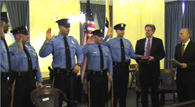 Mayor Cahill swears in five new officers that were laid off by Franklin Township earlier this year.